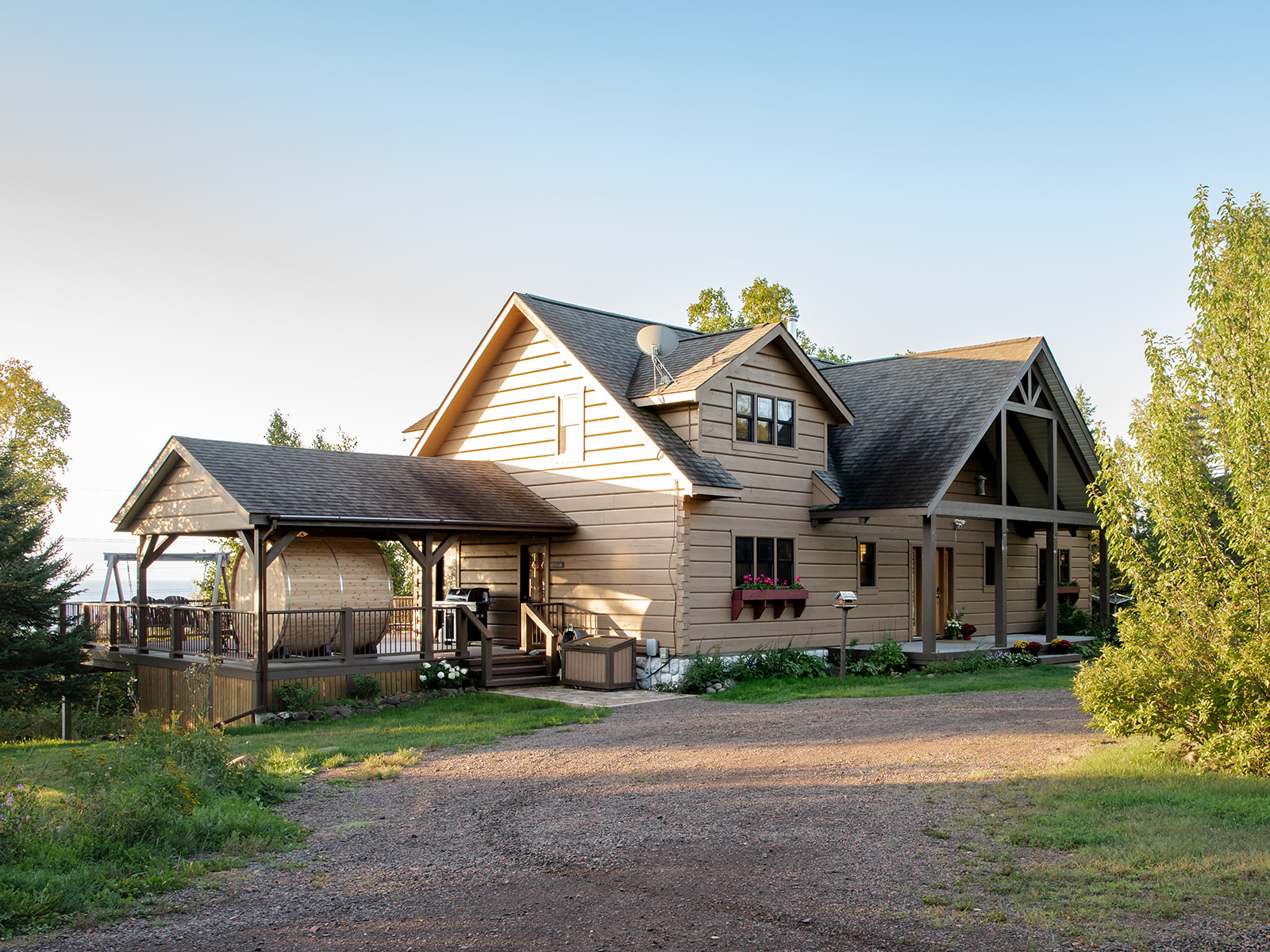 Leveaux Lodge exterior among the trees